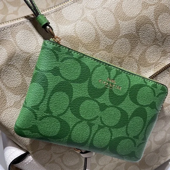 Coach Corner Zip Wristlet In Signature Canvas 
Im/Neon Green - Picture 10 of 16